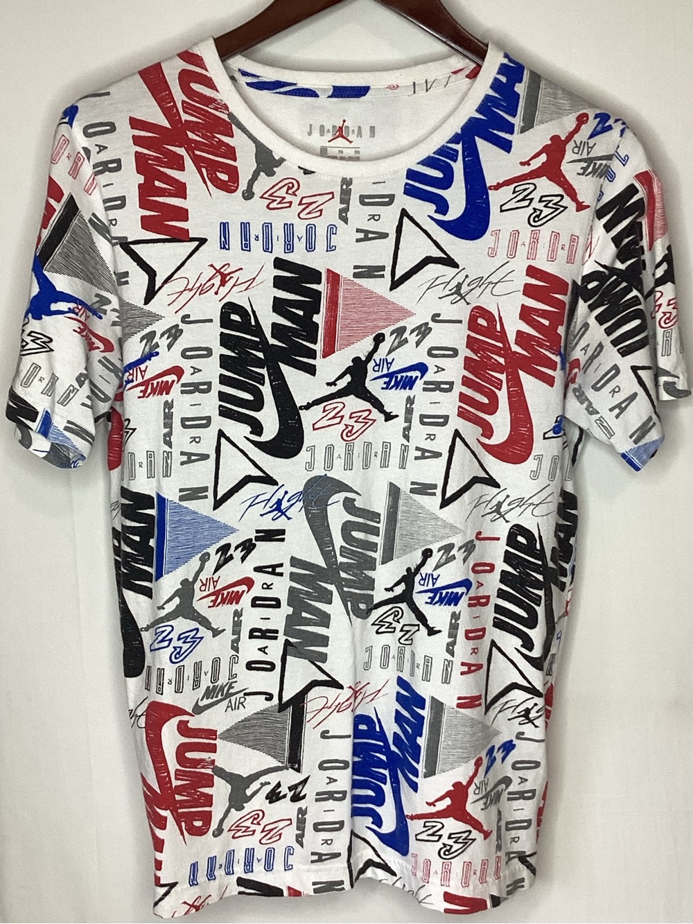 Jordan White Allover Logo Short Sleeve Tee with Red, Blue, Gray Accents